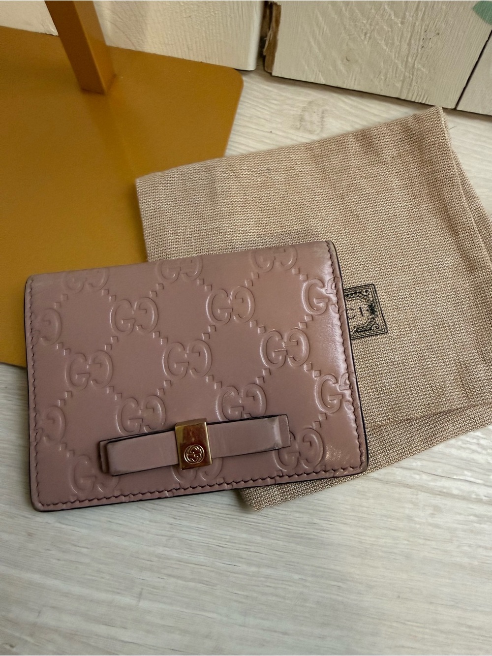 GUCCI
Light Pink Guccissima Leather Bow Card Case